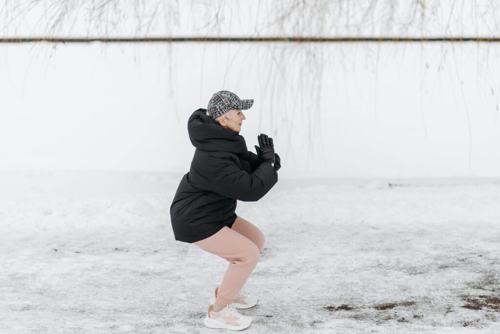 woman working out on a snowy day