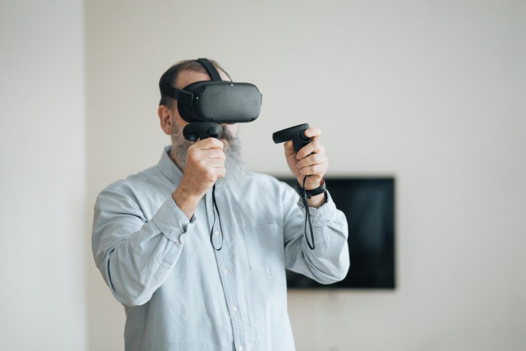 man playing with VR set