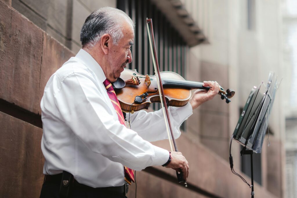 man playing instrument